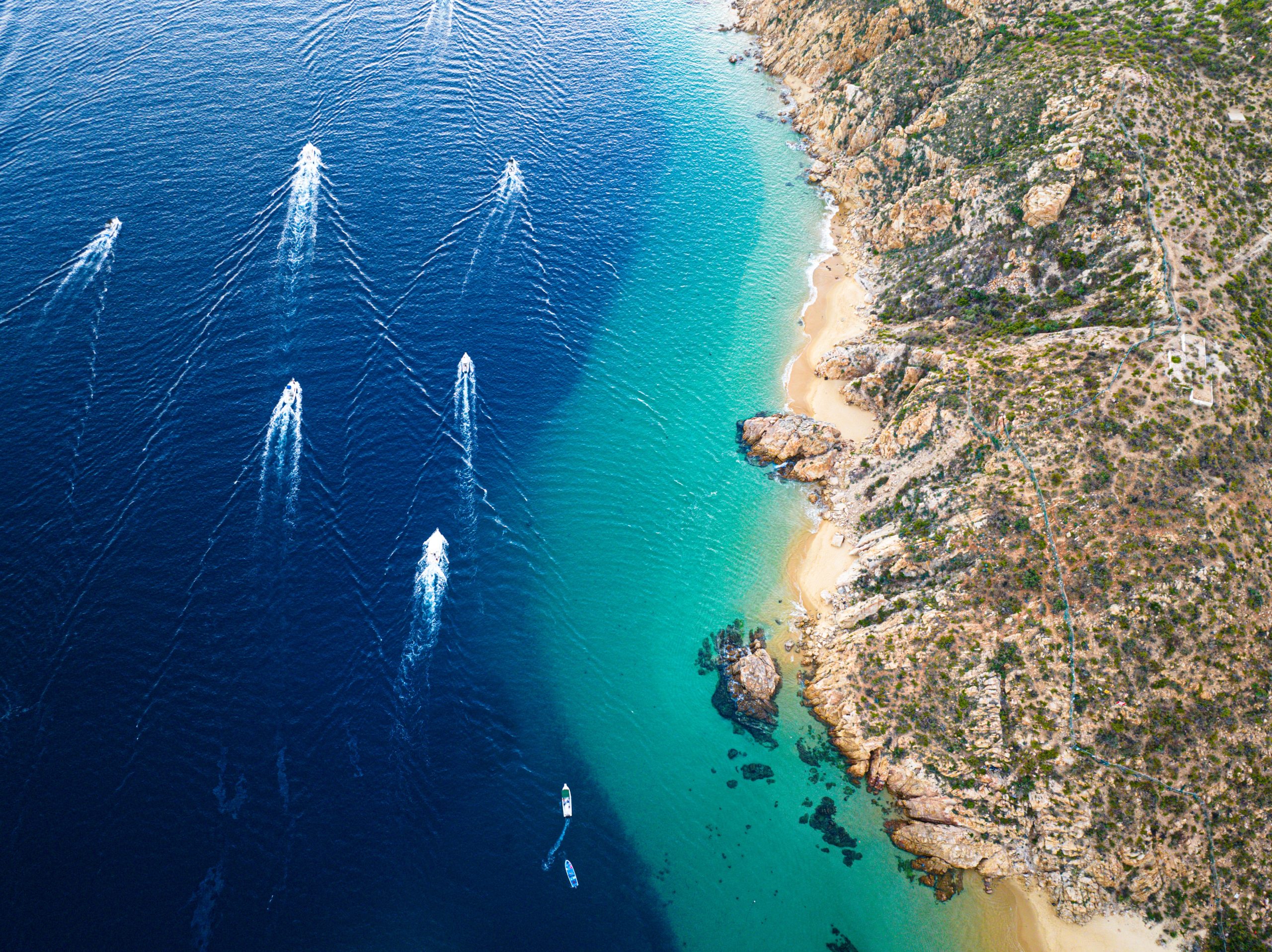 overview of boats on the coast of cabo